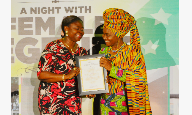 Asabea Cropper(right) being presented with her award Asabea Cropper(right) being presented with her award
